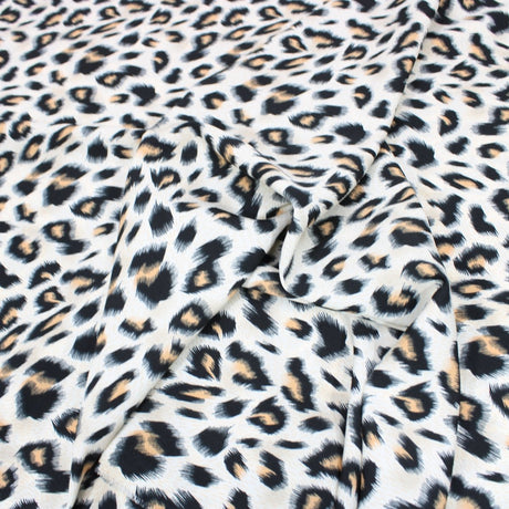 3 Metres Dressmaking Cheetah Print Crepe Georgette- 55" Wide Cream & Orange - Pound A Metre